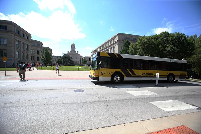A cambus stops to pick up students during the first week of classes on Tuesday, August 23. You can view the new cambus routes online. (The Daily Iowan/ Alex Kroeze)