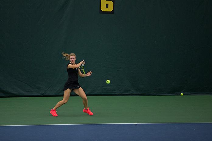 Iowa's Montana Crawford returns a volley in her match against Missouri State Faty Khamissi, the Iowa Hawkeyes took an easy win against Missouri State with an overall 10-1 score at the Hawkeye Tennis and Recreation Complex in Iowa City, Iowa on Jan. 31, 2016(The Daily Iowan/Anthony Vazquez)