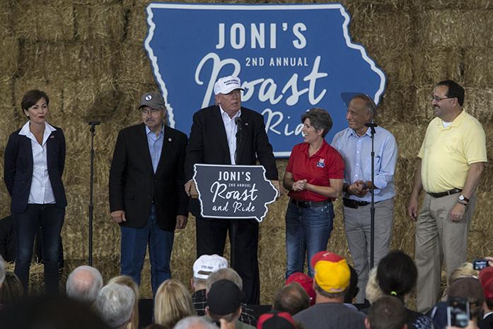 Lt. Governor Kim Reynolds, Iowa Governor Terry Branstad, Republican presidential nominee Donald Trump, Iowa Senator Joni Ernst, Iowa Representative Steve King, State GOP Chairman Jeff Kauffman share the stage during Iowa Senator Joni Ernsts second annual Roast and Ride event in Des Moines on Saturday, August 27, 2016. The event started with a 42-mile motorcycle ride from the Big Barn Harley-Davidson dealership to the Iowa State Fairgrounds where Ernst hosted a rally with fellow Republican leaders headlined by Trump. (The Daily Iowan/Joseph Cress)