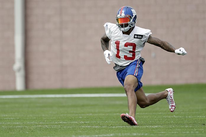FILE - In this  July 30, 2016, file photo, New York Giants wide receiver Odell Beckham runs a drill during NFL football training camp in East Rutherford, N.J. The Giants open the preseason on Friday, Aug. 12, 2016, when they host the Miami Dolphins. (AP Photo/Julio Cortez, File)