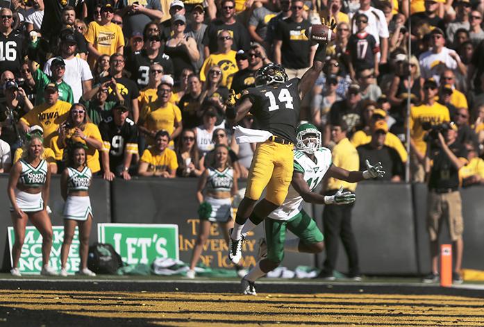 Iowa defensive back Desmond King blocks a pass ment for North Texas wide receiver Thaddeous Thompson during the Iowa-North Texas game in Kinnick Stadium on Saturday, Sept. 26, 2015. The Hawkeyes defeated the Mean Green, 62-16. (The Daily Iowan/Margaret Kispert)