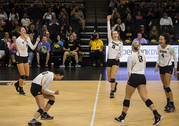 Iowa players celebrate after Iowas no. 10 Loxley Keala scores a kill during a volleyball match at Carver Hawkeye Arena in Iowa City on Wednesday, Sept. 28 , 2016. Iowa defeated Maryland 3-0. (The Daily Iowan/Ting Xuan Tan)