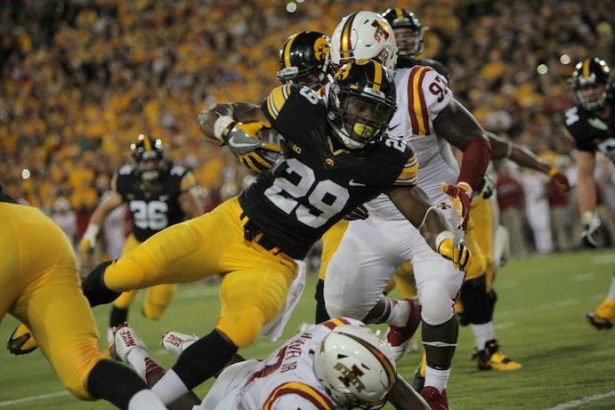 Hawkeyes turn on the lights, 42-3; Cyclones left in the dark