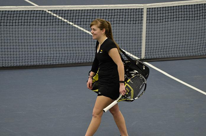 Zoe Douglas walks over to her court on Saturday Feb 13, 2016 at the Hawkeye Tennis and Recreation Complex. She lead UMKC opponent Maria Albert, 6-4, 4-1. (The Daily Iowan/Karley Finkel)