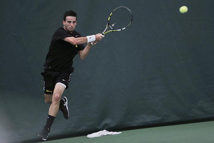 Iowas Josh Silverstein hits the ball during the Iowa-Minnesota meet in the Hawkeye Tennis and Recreation Complex on Sunday, March 28, 2016. The Hawkeyes defeated the Golden Gophers, 4-1. (The Daily Iowan/ Margaret Kispert)