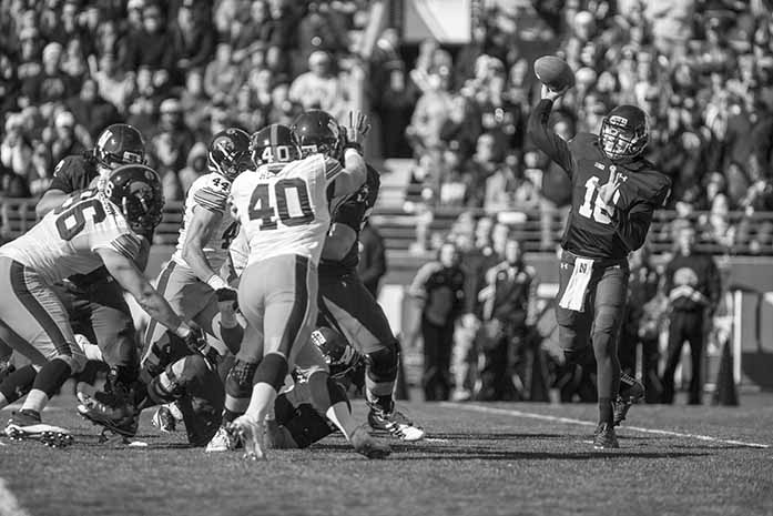 Northwestern quarterback Thorson attempts a pass during the Iowa-Northwestern game on Saturday, Oct. 17, 2015. Thorson threw for 125 yards and was sacked three times. The Hawkeyes beat the Wildcats, 40-10. (The Daily Iowan/Sergio Flores)