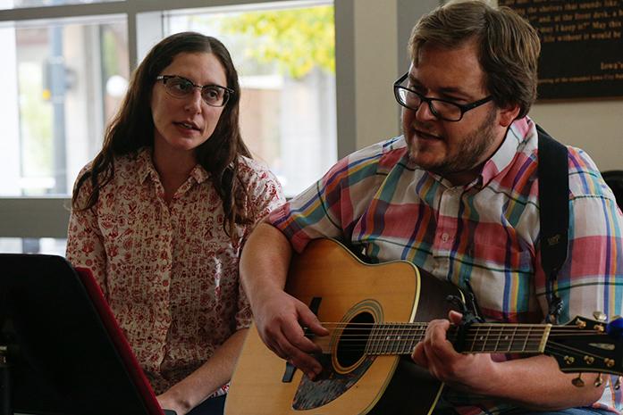 Dave Helmer and Sam Drella of Crystal City perform one of their songs at the Iowa City Public Library on Wednesday, Oct. 19, 2016. Crystal City performed at the public library as part of the librarys Music on Wednesday program. (The Daily Iowan/Anthony Vazquez)