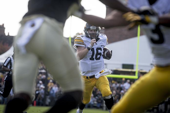 Iowa quarterback CJ Bethard runs the ball for a touchdown during the first half of the Purdue vs. Iowa game at the Ross-Ade-Stadium on Saturday, October 15, 2016. The Iowa Hawkeyes defeated Purdue 49-35. (The Daily Iowan/Jordan Gale)