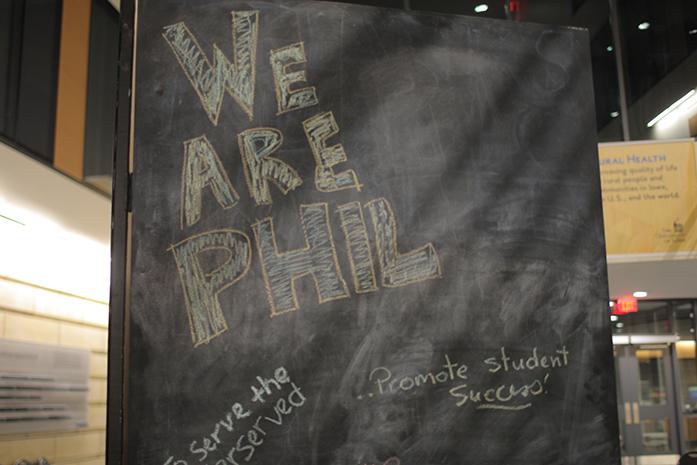 A chalkboard for Phil Week sits at the Public Health Building on October 11 2016 (The Daily Iowan/Osama Khalid)