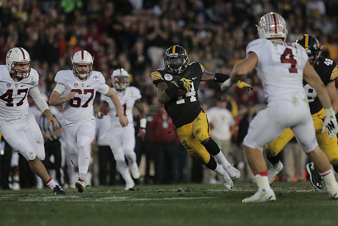 Iowa defensive back Desmond King returns a kick return during the Rose Bowl Game at Rose Bowl Stadium in Pasadena, California on Friday, Jan. 1, 2016. Stanford defeated Iowa, 45-16. (The Daily Iowan/Margaret Kispert)