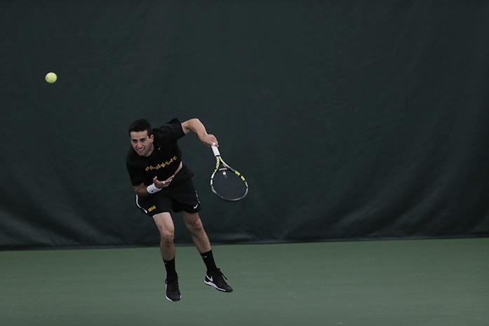 Iowas Josh Silverstein serves the ball during the Iowa-Minnesota meet in the Hawkeye Tennis and Recreation Complex on Sunday, March 28, 2016. The Hawkeyes defeated the Golden Gophers, 4-1. (The Daily Iowan/ Margaret Kispert)