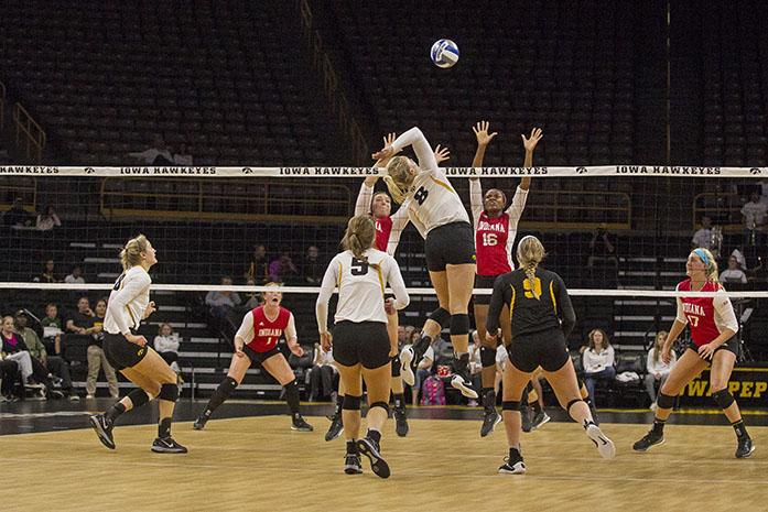 Iowa's no. 8 Reghan Coyle returns the ball during a volleyball match at the Carver Hawkeye Arena in Iowa City on Saturday, Oct 8, 2016. Iowa defeated Indiana 3-0. (The Daily Iowan/Ting Xuan Tan)