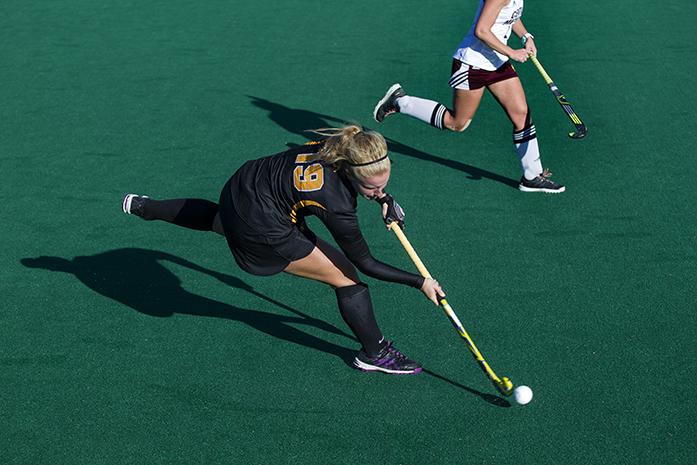Iowas no. 19 Ryley Miller passes the ball during a field hockey match at Grant Field in Coralville on Friday, Oct 7, 2016. Iowa defeated Central Michigan 11-0. (The Daily Iowan/Ting Xuan Tan)
