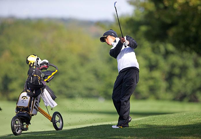 Iowa golfer Jessica Ip hits the ball at the Diane Thomason Invitational at Finkbine Golf Course on Saturday and Sunday Oct. 4-5, 2014. The Illinois Fighting Illini took first in the tournament, beating Iowa by 14 strokes. (The Daily Iowan/Margaret Kispert)