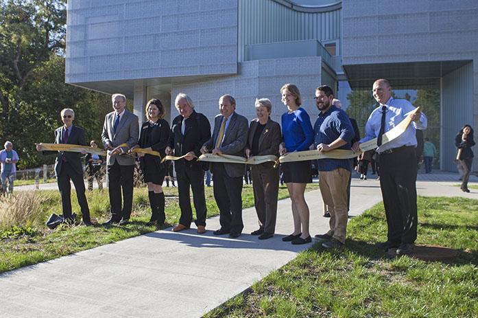 UI's Visual Arts Building ribbon-cutting on Friday, Oct. 7, 2016. Those featured include Jackie Lewis, Bruce Harreld, Beth Freeman, John Beldon Scott, Steve McGuire, Steven Holl, Elinor Kreiger-Coble, Robert Scott, and Alan MacVey. (The Daily Iowan/Olivia Sun)