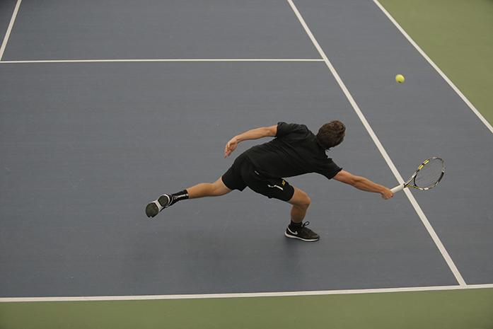 Iowas Robin Haden reaches for the ball during his match against Minnesota’s Josip Krstanovic  at the Hawkeye Tennis & Recreation Complex on Sunday, March 28, 2016. Haden defeated Krstanovic (6-2, 6-3). (The Daily Iowan/Margaret Kispert)