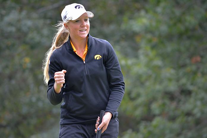Iowa golfer Jessie Sindlinger celebrates after a putt at the Diane Thomason Invitational at Finkbine Golf Course on Saturday and Sunday Oct. 4-5, 2014. The Illinois Fighting Illini took first in the tournament, beating Iowa by 14 strokes. (The Daily Iowan/Valerie Burke)