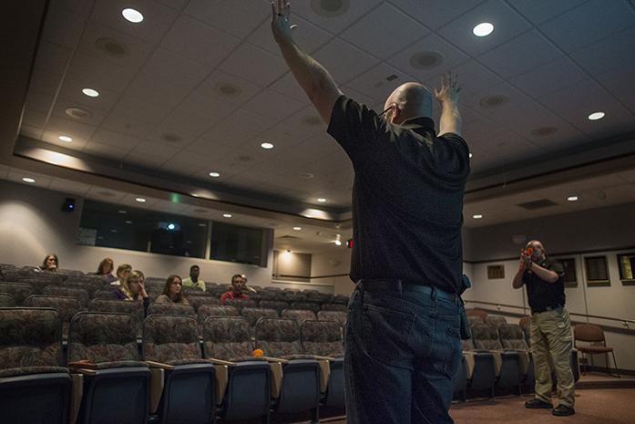 Lieutenant Eric Werling and Officer Jess Bernhard participate in a simulated active-shooter scenario during a UI Police Violent Incident Survival Training course in the UI Hospital on Tuesday, October 18, 2016. The VIST training lasts two and a half hours and covers a flexible set of principles of the Alert, Lockdown, Inform, Counter, Evacuate system to prepare participants in the event that they are involved in a violent situation. (The Daily Iowan/Joseph Cress)