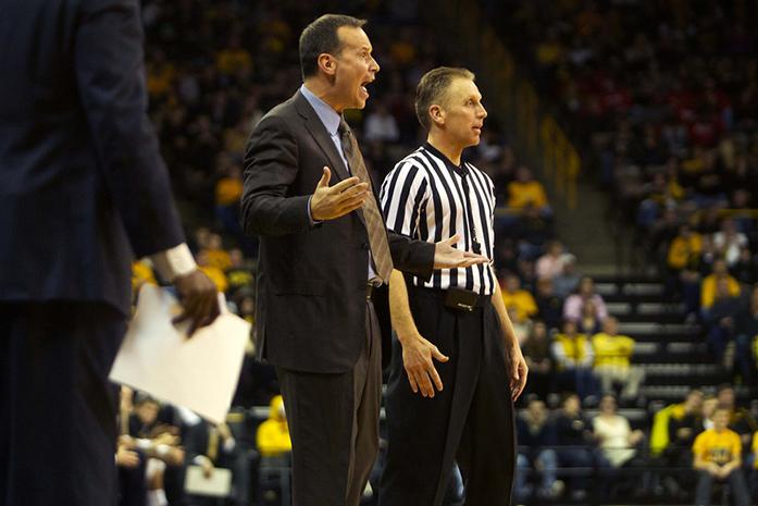 Northwestern head Coach Chris Collins yells at the team from the side lines after a bad play during the game at Carver-Hawkeye Arena on Thursday, Jan. 9, 2013. Iowa went on to defeat Northwestern 93-67. (The Daily Iowan/Callie Mitchell)