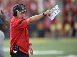 FILE - In this Sept. 3, 2016, file photo, Maryland head coach DJ Durkin gestures during the second half of an NCAA football game against Howard in College Park, Md. Though first-year coach DJ Durkin is known for his defensive prowess, Maryland is unbeaten because of an attack that has rung up 123 points, second-most in school history after three games. (AP Photo/Nick Wass, File)