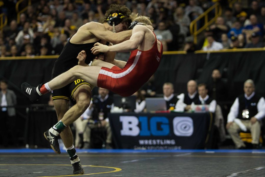 Iowas+125-pounder+Thomas+Gilman+takes+down+Nebraskas+Tim+Lambert+during+the+final+rounds+of+the+Big+Ten+Championships+at+Carver-Hawkeye+Arena+on+Sunday%2C+March+6%2C+2016.+Iowas+Thomas+Gilman+went+placed+third+in+his+weight+division+of+125+pounds.+%28The+Daily+Iowan%2FAnthony+Vazquez%29