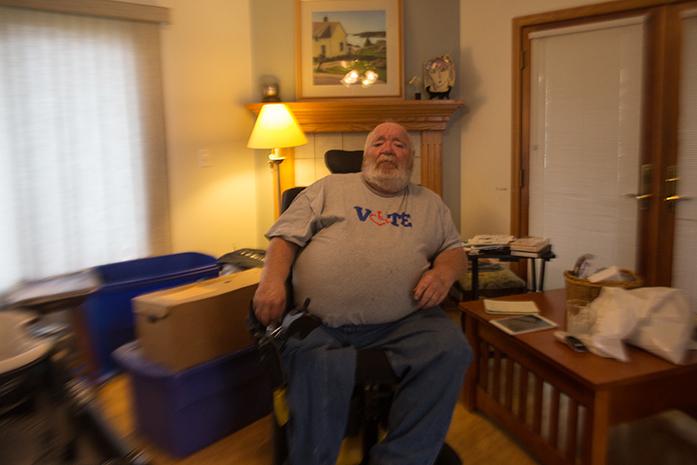Harry Olmstead poses for picture at his home, in Iowa City on Monday, Oct. 25, 2016. Harry Olmstead has been working to improve accessibility to the polls for individuals with disabilities. (The Daily Iowan/Anthony Vazquez)