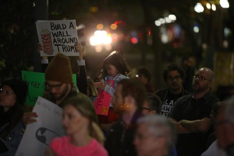 Local protesters listen to speakers talk about the outcome of the recent election of Donald Trump on Thursday, November 10, 2016. The protest took place downtown Iowa City in front of the Marriott Hotel from 5-7 pm. 
