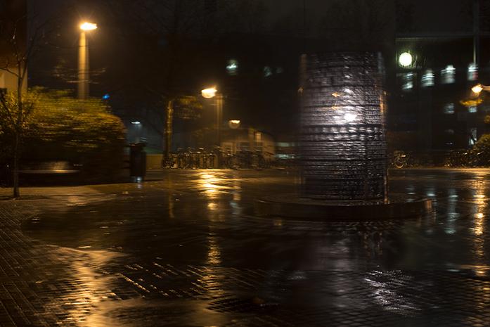 The rain comes down on the walk way in-between the Communications building and Adler Journalism Build on Sunday.  (The Daily Iowan/Margaret Kispert)