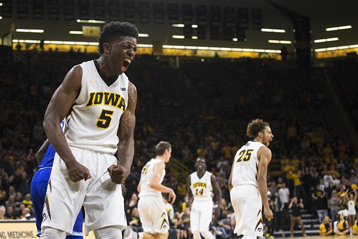 Iowa forward Tyler Cook reacts after dunking a ball during a basketball game in Carver-Hawkeye Arena on Thursday, Nov. 17, 2016. The Pirates defeated the Hawkeyes, 91-83, in Iowa City. (The Daily Iowan/Joseph Cress)
