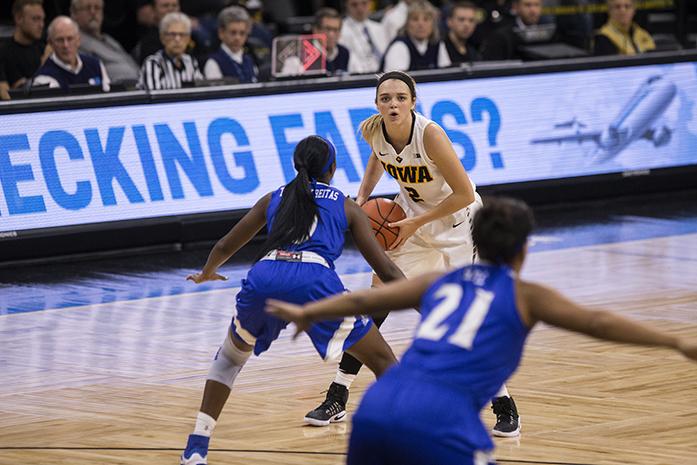 Iowa guard Ally Disterhoft looks to pass during the basketball match at the Carver Hawkeye Arena in Iowa City on Sunday, Nov. 13, 2016. Iowa defeated Hampton 84-51. (The Daily Iowan/Ting Xuan Tan)