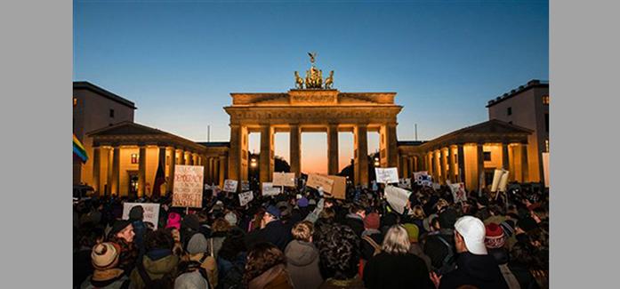 Demonstrators+protest++near+the+American+Embassy+in+front+of+the+Brandenburg+Gate+in+Berlin%2C%E2%80%A0Germany%2C++Saturday+Nov.+12%2C+2016.+About+300+people+protested+Donald+Trump%C3%ADs+election+as+the+next+American+president+outside+the+U.S.+Embassy+by+the+German+capital%C3%ADs+landmark+Brandenburg+Gate.+The+peaceful+protesters+Saturday+waved+signs+with+slogans+like+%C3%ACLove+Trumps+Hate%C3%AE+and+%C3%ACMake+Love%2C+Not+Trump.%C3%AE++%28Gregor+Fischer%2Fdpa+via+AP%29