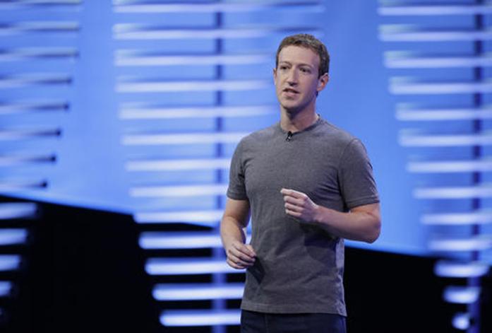FILE- In this April 12, 2016, file photo, Facebook CEO Mark Zuckerberg speaks during the keynote address at the F8 Facebook Developer Conference in San Francisco. CEOs of major companies are taking stands about the results of the November 2016 U.S. election, a departure from the traditional model of not mixing politics with business that the major brands have long espoused. Zuckerberg said “progress does not move in a straight line.” (AP Photo/Eric Risberg, File)
