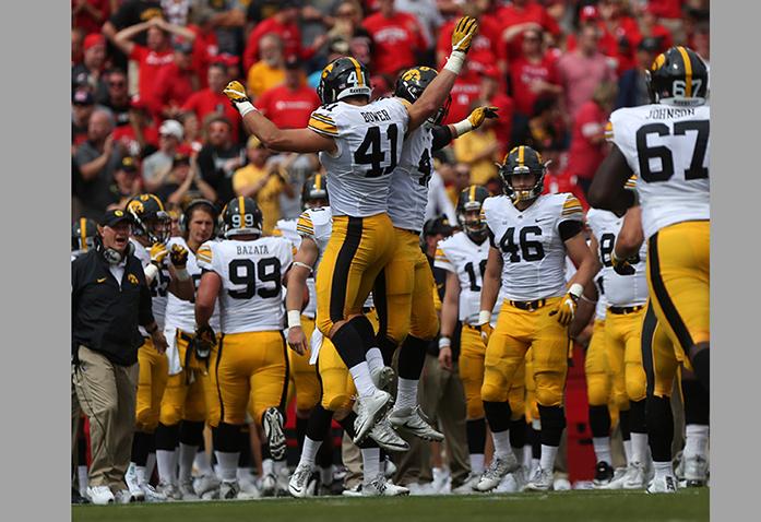 Iowas Bo Bower and Josey Jewell celebrate a stopped Rutgers touchdown during the Iowa-Rutgers game at High Point Solution Stadium at Piscataway on Saturday, Sept. 24, 2016. The Hawkeyes defeated the Knights, 14-7. (The Daily Iowan/Margaret Kispert)