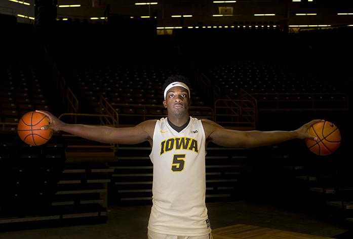 Iowa forward Tyler Cook palms two balls during mens basketball media day press conference in Carver-Hawkeye Arena on Wednesday, October 5, 2016. The Hawkeyes will play their first regular season game on Friday, November 11, at Carver-Hawkeye Arena at 8:30 p.m. against Kennesaw State. (The Daily Iowan/Margaret Kispert)