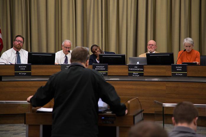 Iowa City City Council members listen while a person speaks during a meeting on Tuesday, Dec. 6, 2016. The Council unanimously passed a resolution that aims to reduce 25 to 28 percent of Iowa City’s greenhouse-gas emissions by 2025. (The Daily Iowan/Joseph Cress)