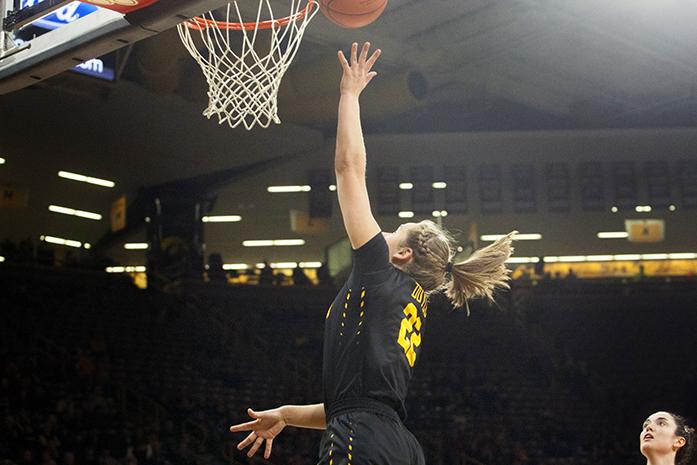 Iowa guard Kathleen Doyle performs a layup during a women's basketball game in Carver Hawkeye-Arena on Wednesday, Dec. 7, 2016. The Hawkeyes defeated the Cyclones, 88-76. (The Daily Iowan/Joseph Cress)
