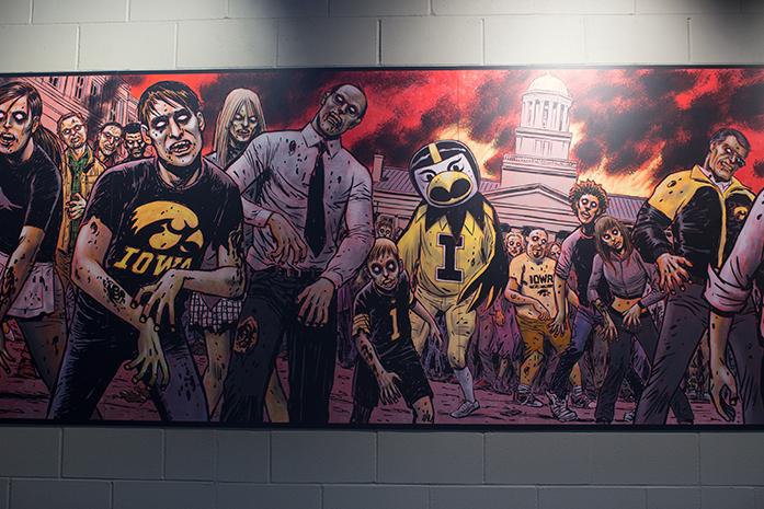 A mural sits inside Zombie Burger’s on Nov. 29. Zombie Burger is a Des Moines-based chain offering zombie-theme burgers and shakes. (The Daily Iowan/Ting Xuan Tan)