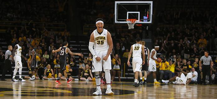 Iowa forward Cordell Pemsl celebrates after an Iowa made basket in the game between Nebraska-Omaha vs. Iowa at Carver Hawkeye on Saturday, December 3, 2016. The Hawkeyes comeback fell short, being defeated by the Mavericks  98-89. (The Daily Iowan/ Alex Kroeze)