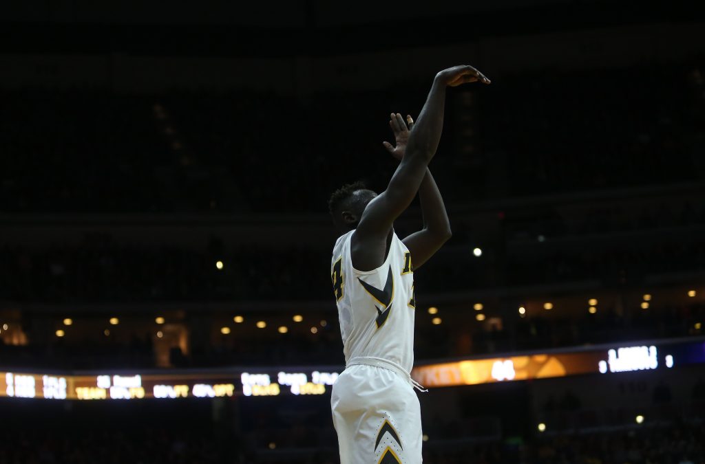 Iowa guard Peter Jok shoots the ball during the first game of The Hy-Vee Classic with Iowa and UNI in Wells Fargo Arena in Des Moines on Saturday, Dec. 17, 2016. The Hawkeyes defeated the Panthers, 69-46. (The Daily Iowan/Margaret Kispert)