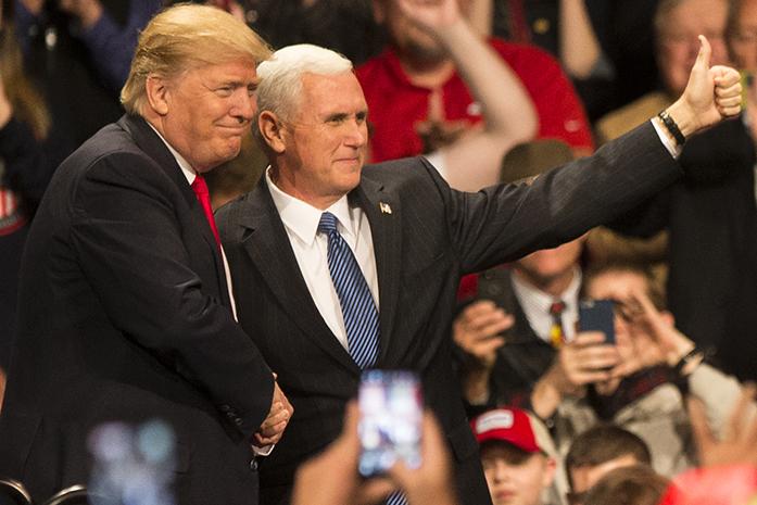 Donald+J.+Trump+and+Vice+President-Elect+Mike+Pence+shake+hands+during+an+event+in+Des+Moines+on+Thursday%2C+Dec.+8%2C+2016.+Trump+and+Pence+are+completing+a+Thank+You+tour+across+the+country.+%28The+Daily+Iowan%2FJoseph+Cress%29