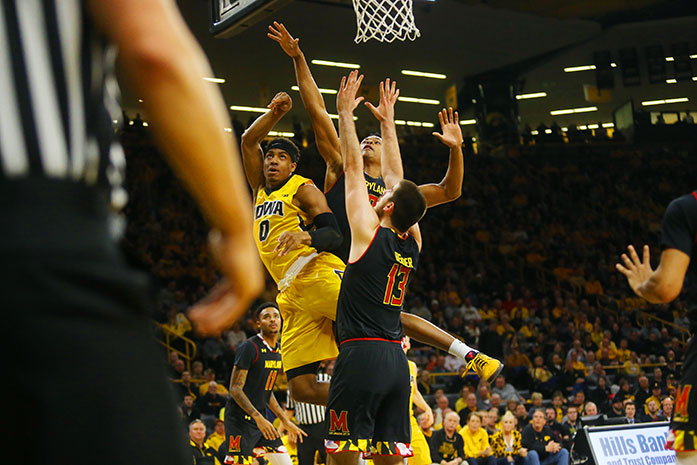 Iowa+forward+Ahmad+Wagner+gets+fouled+on+a+layup+attempt+during+the+game+between+Iowa+and+Maryland+at+Carver+Hawkeye+on+Thursday%2C+January+19%2C+2017.+The+Hawkeyes+made+a+strong+second+half+push+but+came+up+short+to+the+Terrapins+by+the+final+score+of+84-76.+%28The+Daily+Iowan%2F+Alex+Kroeze%29