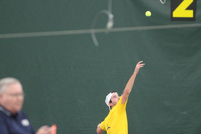 Iowas Josh Silverstein serves a tennis ball during the Iowa-Western Michigan mens tennis match at the Hawkeye Tennis and Recreation Complex on Jan. 21, 2017. The Hawkeyes defeated the Broncos, 5-2. (The Daily Iowan/Lily Smith)