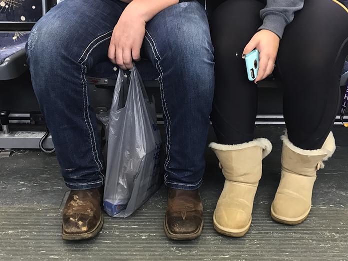 A couple sits together on a Cambus on Saturday, Jan. 21, 2017. (The Daily Iowan/Lily Smith)