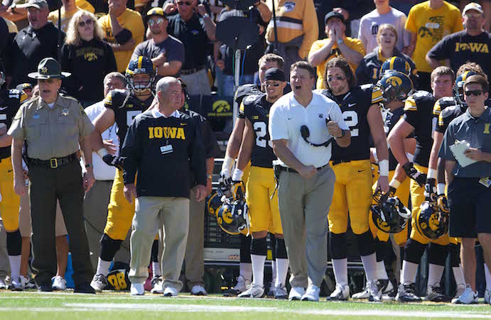 The Offensive line coach Brian Ferentz shouts  to the referees about his judgement at Kinnick Stadium on Saturday, September 21st, 2013. Iowa defeated Western Michigan, 59-3. (The Daily Iowan/Wanyi Tao)