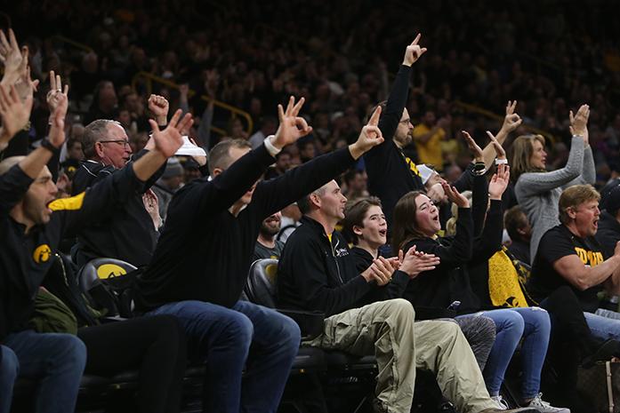 Iowa+fans+react+to+a+made+three+during+the+Iowa-Ohio+State+game+in+Carver-Hawkeye+Arena+on+Saturday%2C+Jan.+28%2C+2017.+The+Hawkeyes+defeated+the+Buckeyes%2C+85-72.+%28The+Daily+Iowan%2FMargaret+Kispert%29
