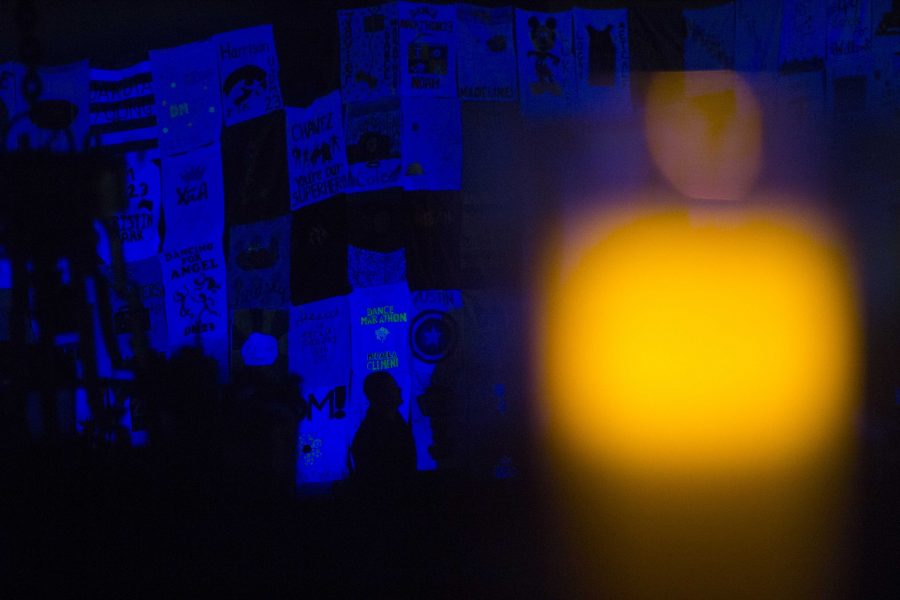 The Dance Marathon candle lights up in front of the pillowcases during the 4th hour of the 23 Dance Marathon at the Iowa Memorial Union on Friday, Feb. 3, 2017. (The Daily Iowan/Margaret Kispert)
