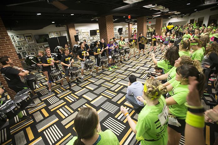 The Hawkeye Drumline performs during the tenth hour of the 23rd Dance Marathon at the Iowa Memorial Union on Saturday, Feb. 4, 2017. They performed for 15 minutes starting at 4:30 a.m. (The Daily Iowan/Joseph Cress)