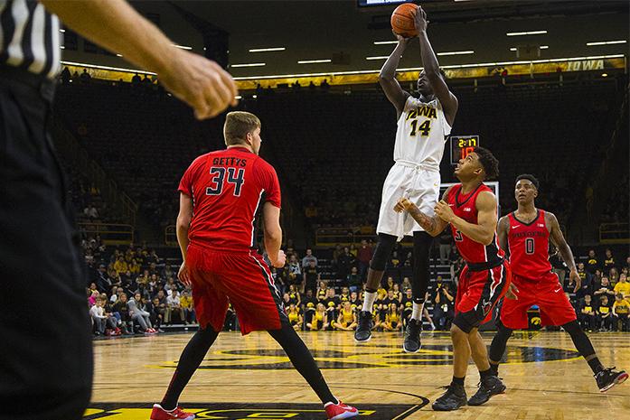 Iowa guard Peter Jok takes a three during a mens basketball game in Carver-Hawkeye Arena between Iowa and Rutgers on Sunday, Jan. 8, 2017. The Hawkeyes defeated the Scarlet Knights, 68-62. (The Daily Iowan/Joseph Cress)