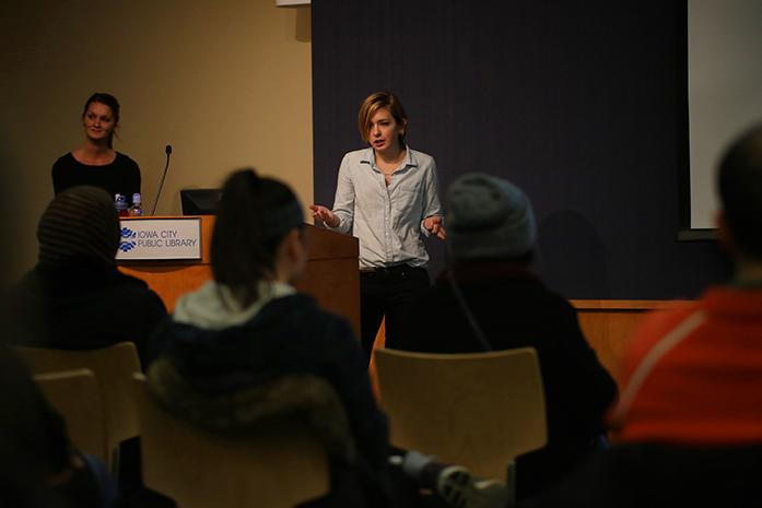 University of Iowa law student; Jessica Donels explains the new immigration executive orders to those who may be directly affected at the Iowa City Public Library on February 8th, 2017. (The Daily Iowan/James Year)