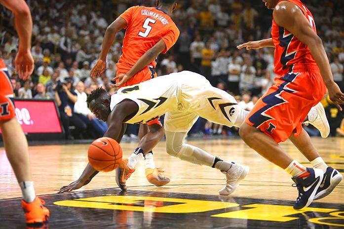 Iowa guard Peter Jok trips and turns the ball over during a game against Illinois in Carver-Hawkeye Arena on Saturday, Feb. 18, 2017. Illinois defeated the Hawkeyes, 70-66. (The Daily Iowan/Joshua Housing)